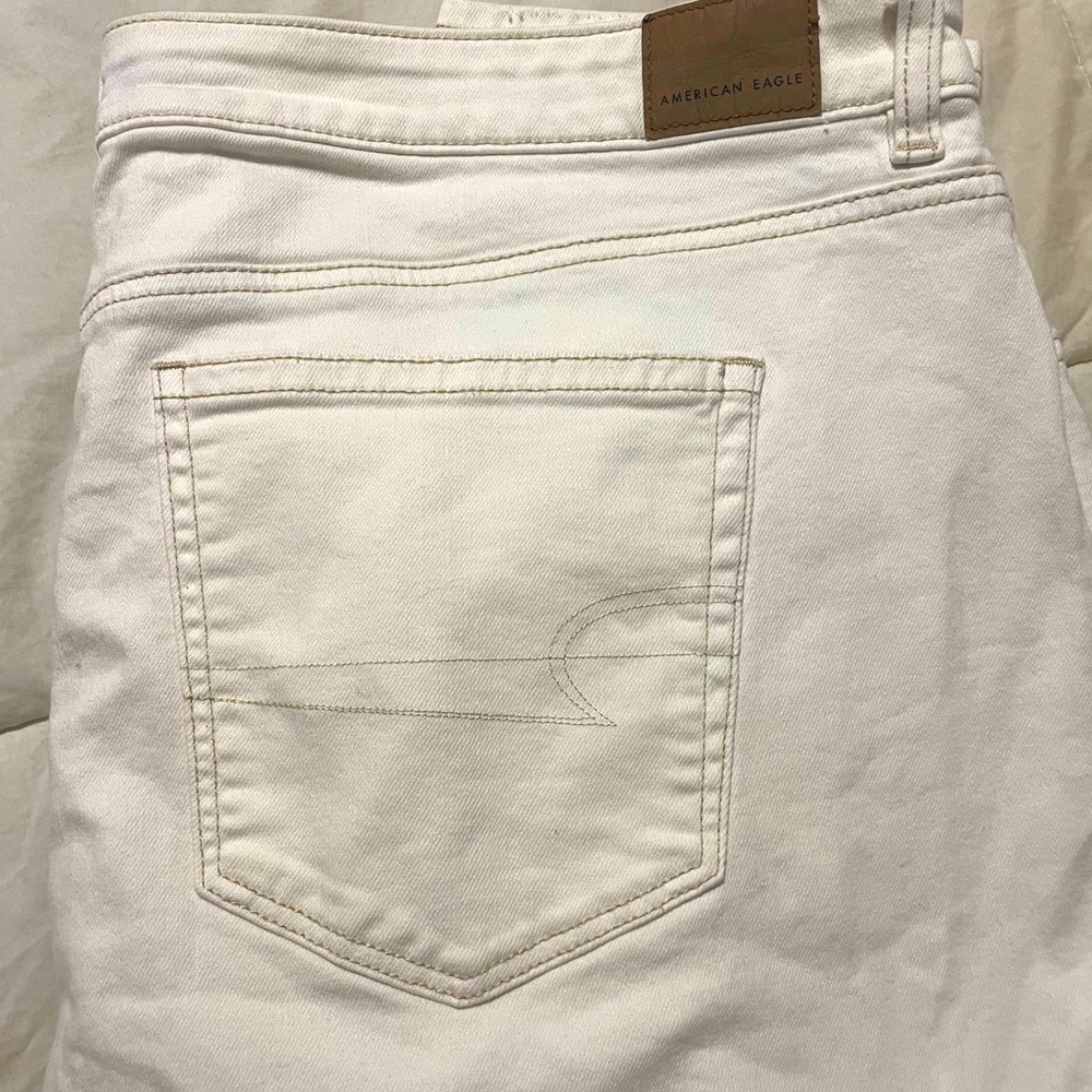 white baggy ripped american eagle jeans